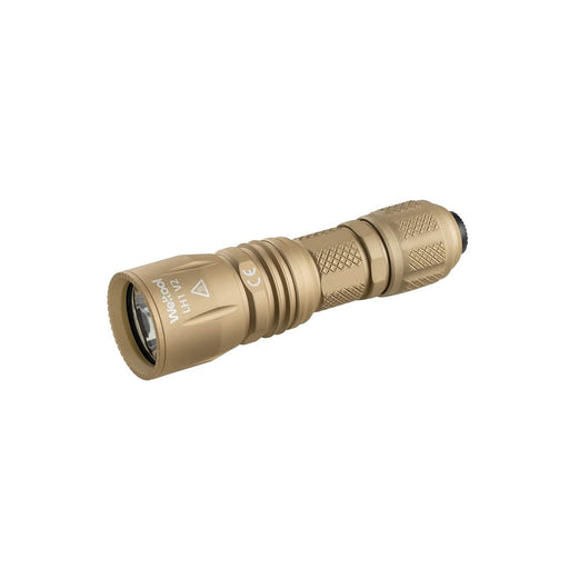 The Weltool T16A is a tan, compact long-throw LED tactical flashlight with a textured grip and a tailcap power button, offering a high-candela beam for impressive distance, shown on a white background.