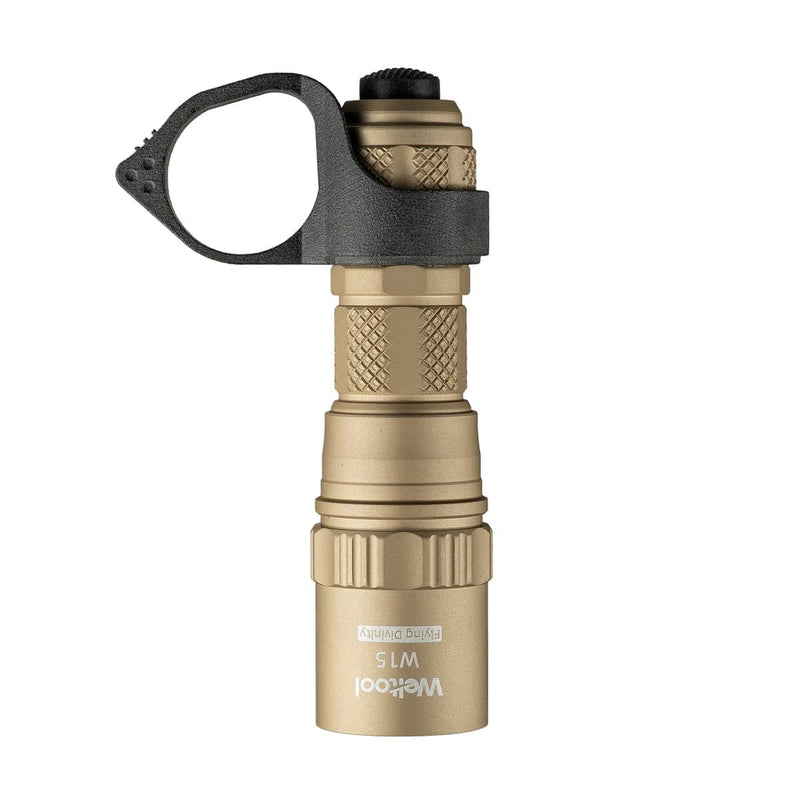 A tan Weltool W15 “Flying Divinity” LEP tactical flashlight features a textured grip and a black ring near the tail cap.