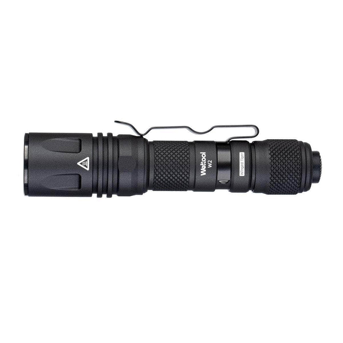 The Weltool W2, a mini LEP tactical flashlight, shines brightly on a plain white background.