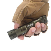 A man holding a Manker MC11 II in his hand.