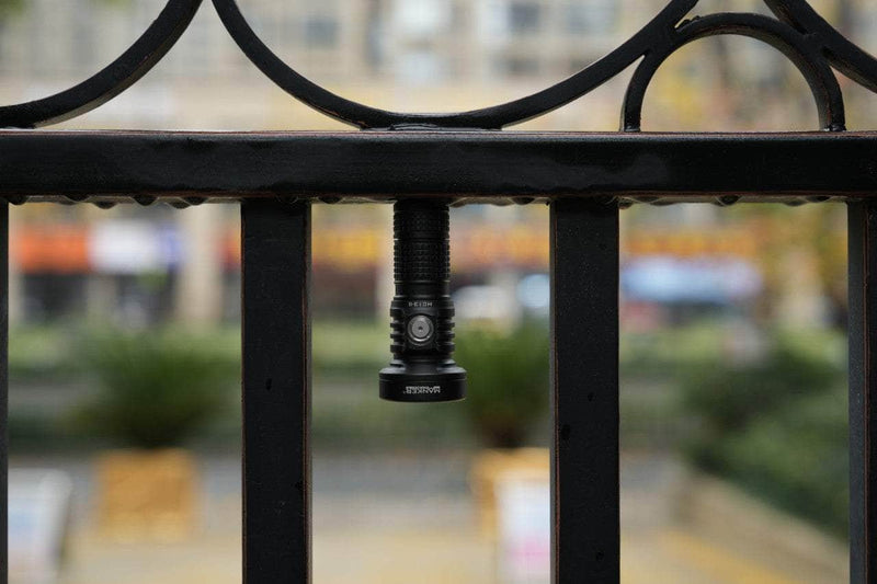 A Manker MC13 II gate with a light attached to it.