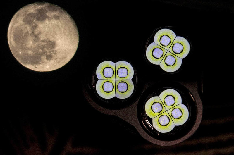 A full moon is seen through a Manker MK34 II.