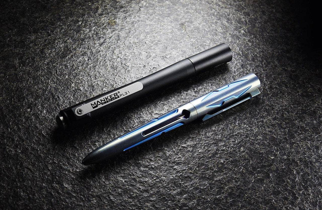 A Manker PL21 pen and a black pen on a black surface.