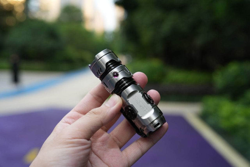 A person holding a Manker Timeback III.