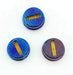 Three ReyLight Pineapple Mini Timascus Button belt buckles, featuring round multi-colored designs with wavy blue and orange patterns and oblong cutouts, are stylishly arranged on a white background.