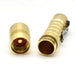 A pair of ReyLight Pineapple Brass flashlights with a red button.